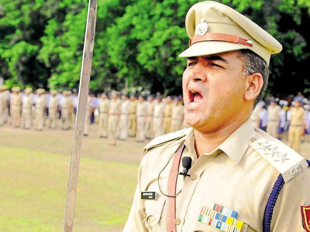 A police officer rehearsing commands for the Independence Day parade, in Chandigarh on Thursday. (Anil Dayal/HT Photo)