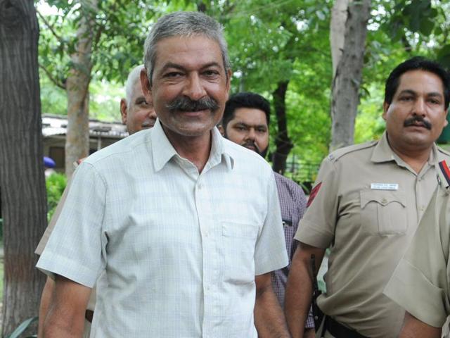 Head constable Balwan Singh (in civvies, white shirt) in custody at the Sector-45 police post in Chandigarh on Thursday. (Anil Dayal/HT Photo) Head constable Balwan Singh (in civvies, white shirt) in custody at the Sector-45 police post in Chandigarh on Thursday. (Anil Dayal/HT Photo)