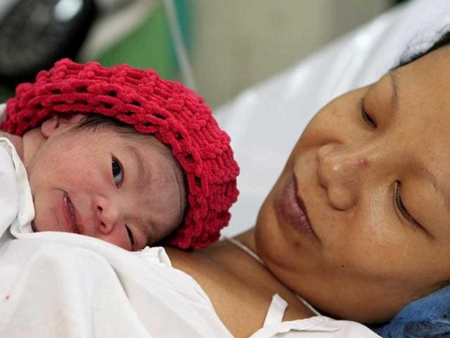 The Maternity Benefit Act, 1961, protects the employment of a woman during the time of her maternity and entitles her to a full paid absence from work to take care of her child.(File photo)