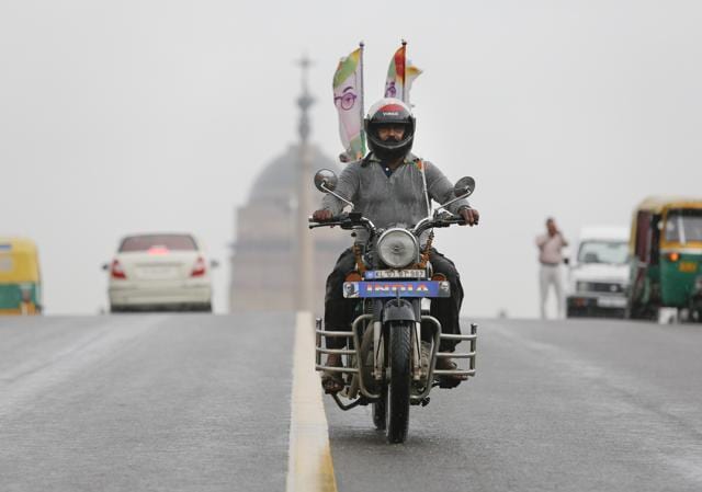 ‘Robin’ Gopalakrishnan Nair with his Royal Enfield bike in front of the Rastrapathi Bhavan in New Delhi. (Sanchit Khanna/HT PHOTO) ‘Robin’ Gopalakrishnan Nair with his Royal Enfield bike in front of the Rastrapathi Bhavan in New Delhi. (Sanchit Khanna/HT PHOTO)