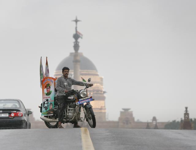‘Robin’ Gopalakrishnan Nair with his Royal Enfield bike in front of the Rastrapathi Bhavan in New Delhi. (Sanchit Khanna/HT PHOTO) ‘Robin’ Gopalakrishnan Nair with his Royal Enfield bike in front of the Rastrapathi Bhavan in New Delhi. (Sanchit Khanna/HT PHOTO)