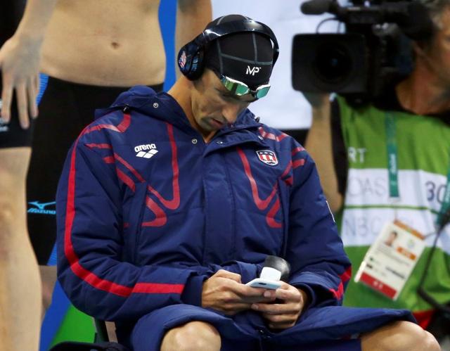 Michael Phelps of the USA wears an "MP" branded cap before the start of the 4 X 200m freestyle relay race. (Reuters) Michael Phelps of the USA wears an "MP" branded cap before the start of the 4 X 200m freestyle relay race. (Reuters)