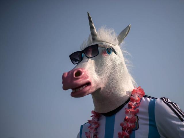 An Argentina horse waits to cheer for his horse friends at the Equestrian events. (AFP)