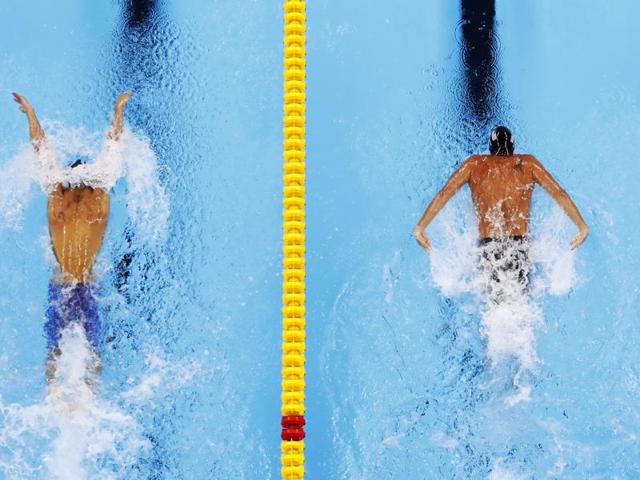 United State's Ryan Lochte, left and Michael Phelps both qualified for the 200m individual medley finals. (AP photo) United State's Ryan Lochte, left and Michael Phelps both qualified for the 200m individual medley finals. (AP photo)