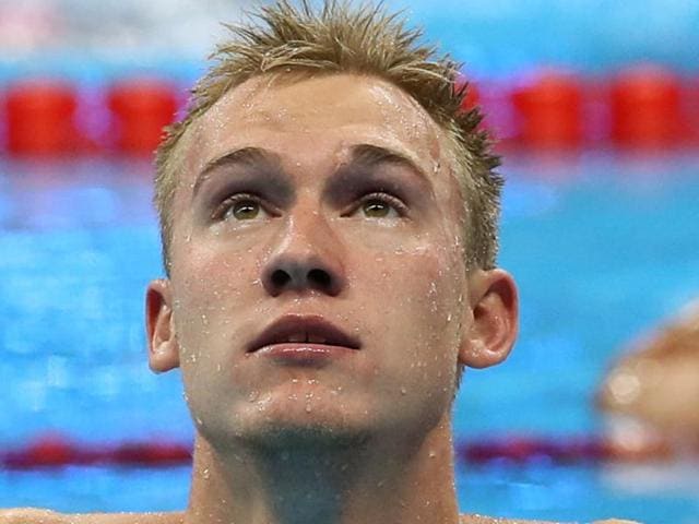 Dmitriy Balandin of Kazakhstan holds his national flag during the medal ceremony. (REUTERS Photo) Dmitriy Balandin of Kazakhstan holds his national flag during the medal ceremony. (REUTERS Photo)