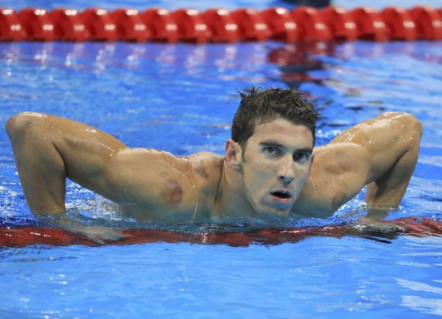 Michael Phelps of the USA competes. (REUTERS) Michael Phelps of the USA competes. (REUTERS)