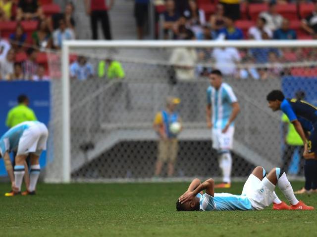 Argentina's footballers react after being eliminated from the Rio Olympics. (AFP photo) Argentina's footballers react after being eliminated from the Rio Olympics. (AFP photo)