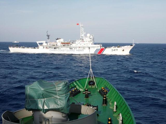 File photo of Chinese dredging vessels in the waters around Mischief Reef in the disputed Spratly Islands of the South China Sea. (Reuters) File photo of Chinese dredging vessels in the waters around Mischief Reef in the disputed Spratly Islands of the South China Sea. (Reuters)