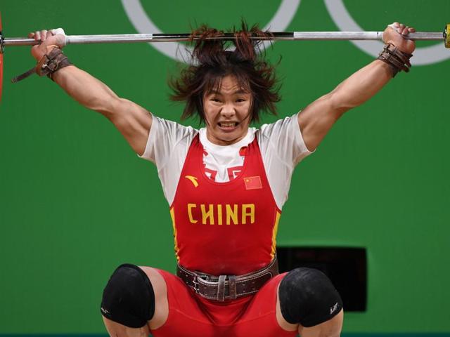 China's Xiang Yanmei competes during the Women's 69kg weightlifting competition. (AFP photo) China's Xiang Yanmei competes during the Women's 69kg weightlifting competition. (AFP photo)