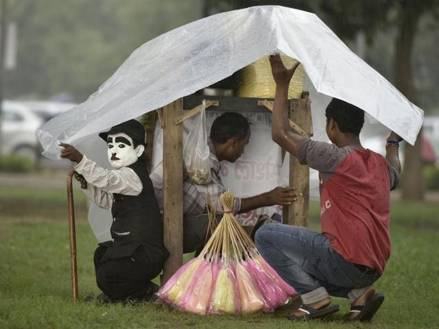 Rain can play spoilsport even on a good day, as it can wash away his carefully done makeup. (Raj K Raj/HT PHOTO)