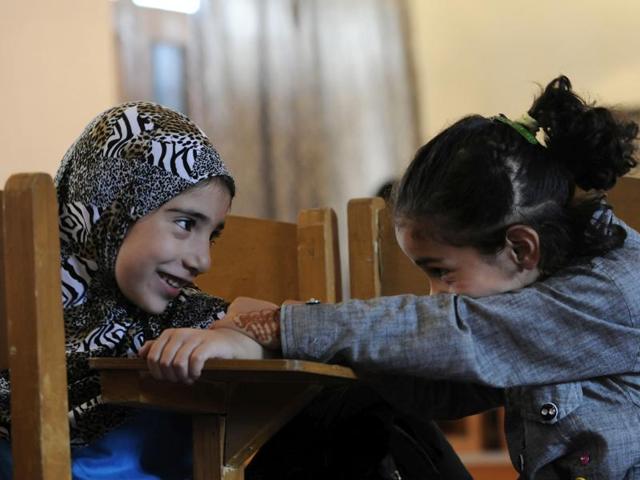 “There are parents who can’t afford private tuitions for their kids, others can afford but can’t send them due to the curfew. Children from every strata of society have enrolled for this schooling,” Volunteer Sumaira Farooq said. (Waseem Andrabi / HT Photo)