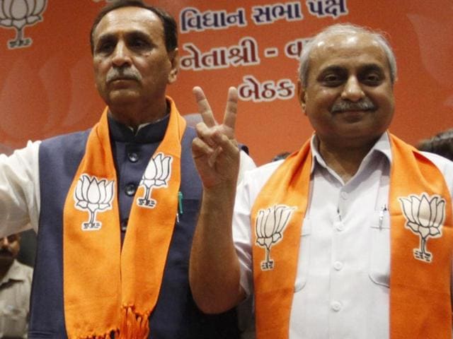 State BJP president Vijay Rupani and minister Nitin Patel elected as chief minister and deputy chief minister during a legislative meeting in Gandhinagar, Gujarat, on August 5, 2016.(Ajit Slonaki/HT Photo)