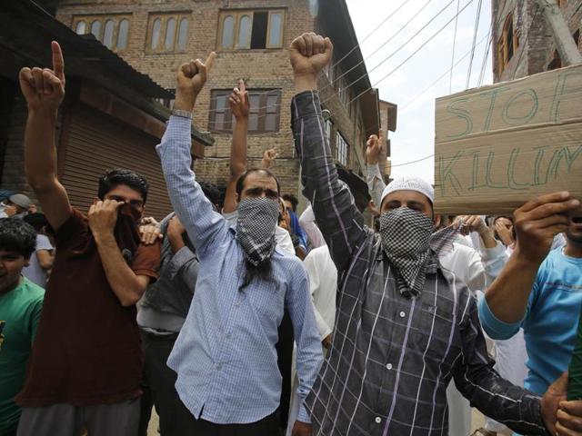 Kashmiri locals carry out a protest in Srinagar in the aftermath of the killing of Hizbul Mujahideen commander, Burhan Wani. The ensuing violence has left close to 60 people dead and thousands injured.(AP Photo)