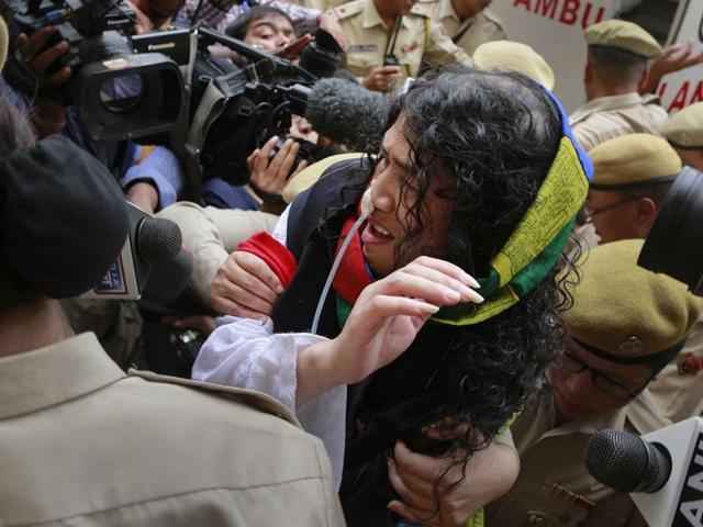 Manipuri human rights activists protest against the Irom Sharmila’s decision to end her hunger strike against Afspa in Imphal. (PTI Photo) Manipuri human rights activists protest against the Irom Sharmila’s decision to end her hunger strike against Afspa in Imphal. (PTI Photo)