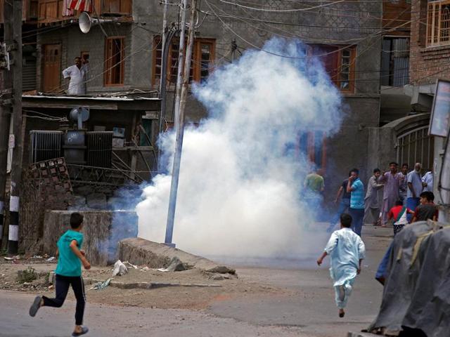 Police (not pictured) fire tear gas during a protest in Srinagar against the recent deaths in Kashmir.(Reuters Photo)