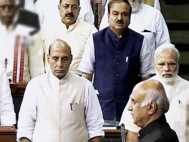 Prime Minister Narendra Modi, home minister Rajnath Singh and other ministers in the Lok Sabha on Friday. (PTI) Prime Minister Narendra Modi, home minister Rajnath Singh and other ministers in the Lok Sabha on Friday. (PTI)
