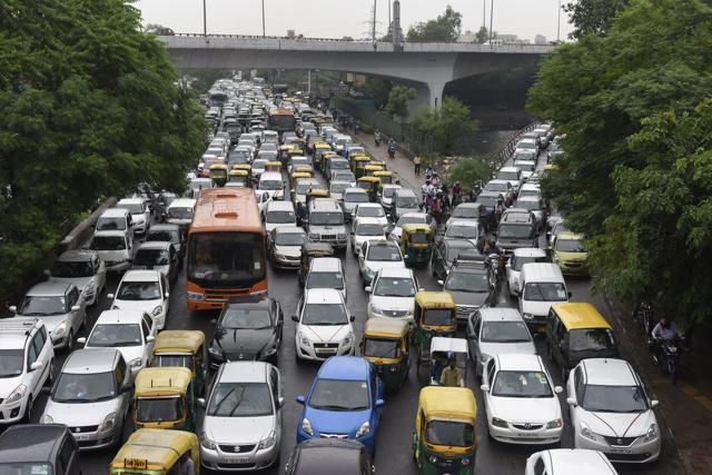 Traffic moves slowly due to rain near Lajpat Nagar in New Delhi on Friday. (Sushil Kumar/Hindustan Times) Traffic moves slowly due to rain near Lajpat Nagar in New Delhi on Friday. (Sushil Kumar/Hindustan Times)