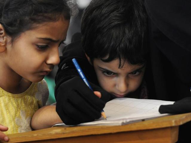 The initiative was started by caretakers of the local mosque, Jamia Masjid Kaw Mohalla, after consulting 20 educated youth of the area who volunteered to start the informal school. (Waseem Andrabi / HT Photo)