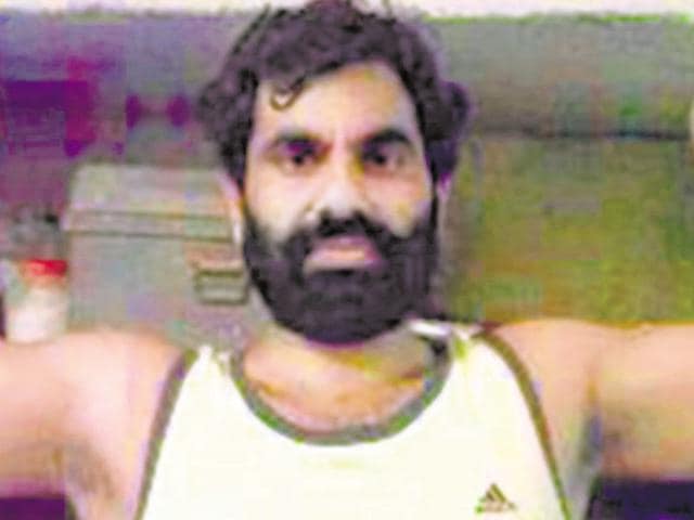 Gangster Anandpal Singh is absconding since last year.(HT File Photo)