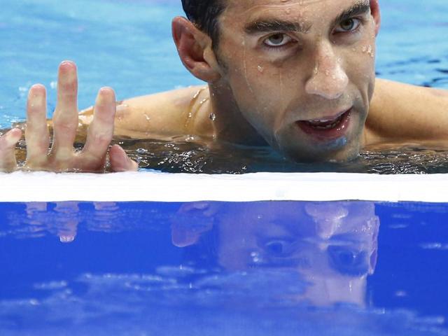 Michael Phelps of the United States won the Olympic 200 metres individual medley on Friday to capture the 22nd gold medal of his career and become the first swimmer to win the same event at four consecutive Games.(REUTERS)