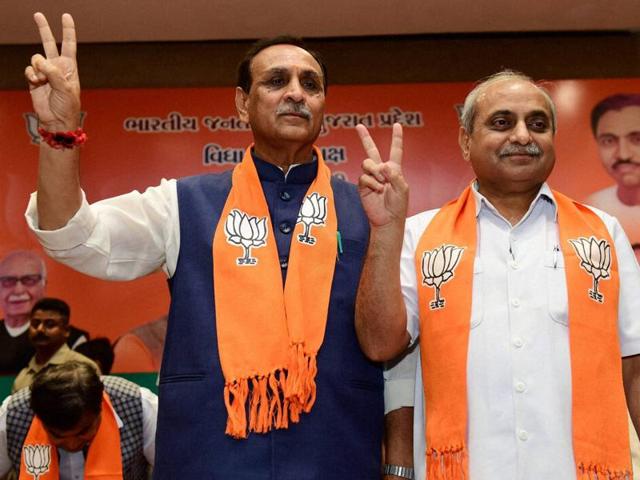 Newly appointed Gujarat chief minister Vijay Rupani and deputy CM Nitin Patel at the state BJP headquarters in Gandhinagar. The Gujarat assembly session begins on August 22. (PTI Photo) Newly appointed Gujarat chief minister Vijay Rupani and deputy CM Nitin Patel at the state BJP headquarters in Gandhinagar. The Gujarat assembly session begins on August 22. (PTI Photo)