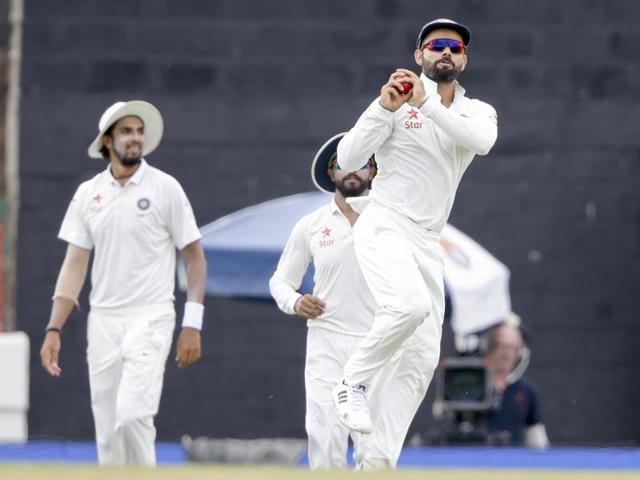 India's captain Virat Kohli leads his team into the field for the first session of day four of the third cricket Test match against West Indies at the Daren Sammy Cricket Ground in Gros Islet, St. Lucia on August 12, 2016.(AP)