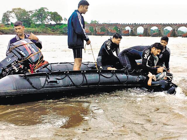 Naval divers recovering the wreck on Saturday.(HT Photo)