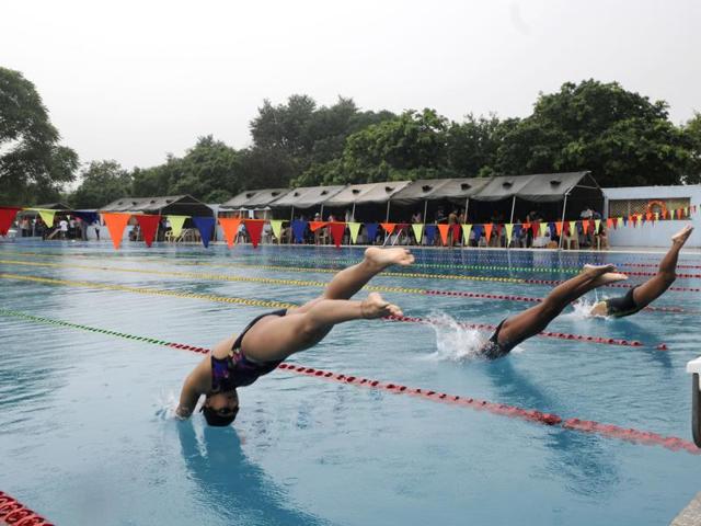 11-year-old swimmer broke his neck when he jumped into cloudy water during the swimming tournament being held by district swimming association at CRPF complex at Kadarpur village. Boy is admitted at AIIMS, also a girl sustained minor injuries on head and nose . (Abhinav Saha/HT Photo) 11-year-old swimmer broke his neck when he jumped into cloudy water during the swimming tournament being held by district swimming association at CRPF complex at Kadarpur village. Boy is admitted at AIIMS, also a girl sustained minor injuries on head and nose . (Abhinav Saha/HT Photo)