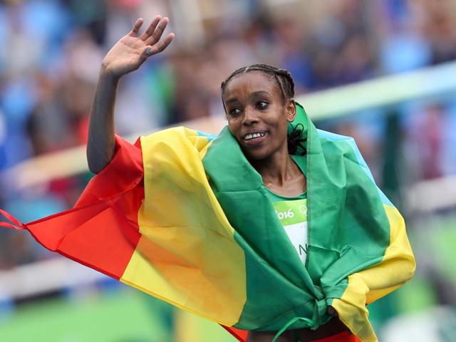 Ethiopia’s Almaz Ayana’s winning time of 29min 17.45sec sliced nearly 14 seconds off the previous world best of 29:31.78 set by Wang Junxia in 1993.(NYT)