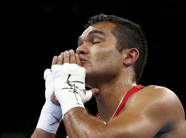 Vikas Krishan reacts after winning his bout against Onder Sipal of Turkey in the 75kg category. (REUTERS photo)