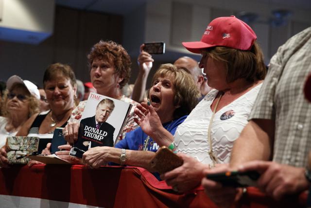Supporters cheer for Republican presidential candidate Donald Trump during a campaign rally in Altoona. (AP)