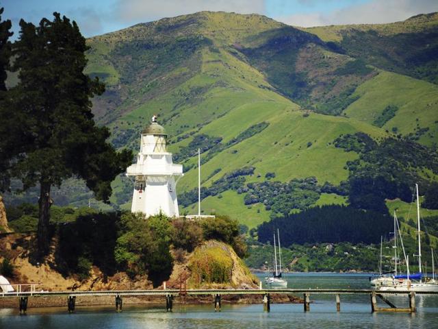 Akaroa, New Zealand: Located on the South Island’s Banks Peninsula, Akaroa was briefly a French colony, some traces of which can still be seen today. The Pacific Ocean cuts deep into the village, making it seem almost like an island. Against the dramatic backdrop carved out by volcanoes, couples can swim with dolphins and go whale-spotting. (iStockphoto) Akaroa, New Zealand: Located on the South Island’s Banks Peninsula, Akaroa was briefly a French colony, some traces of which can still be seen today. The Pacific Ocean cuts deep into the village, making it seem almost like an island. Against the dramatic backdrop carved out by volcanoes, couples can swim with dolphins and go whale-spotting. (iStockphoto)