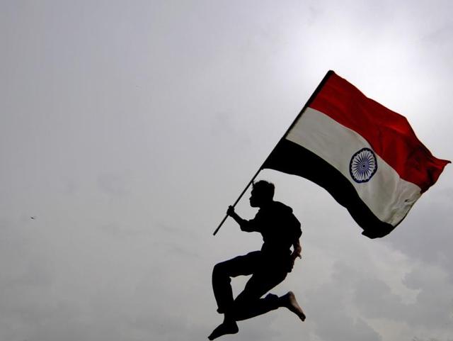 A man with the tricolour in Noida ahead of Independence Day. (Sunil Ghosh /ht photo) A man with the tricolour in Noida ahead of Independence Day. (Sunil Ghosh /ht photo)