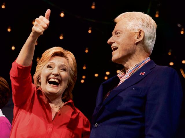 Democratic presidential candidate Hillary Clinton with her husband and former US president Bill Clinton. The couple filed their annual tax returns on Friday. (AP file photo) Democratic presidential candidate Hillary Clinton with her husband and former US president Bill Clinton. The couple filed their annual tax returns on Friday. (AP file photo)