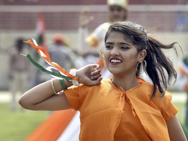 School girl practices during full dress rehearsal for Independence Day celebration at Guru Nanak Stadium in Amritsar. (Gurpreet Singh/ HT Photo)