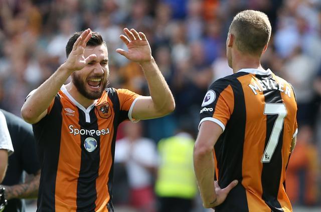 Hull City's Robert Snodgrass and David Meyler celebrate at the end of the game. (REUTERS)