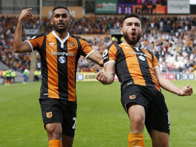 Dejected Leicester City fans look on as the defending champions lose to Hull City in the Premier League opener on Saturday.(REUTERS)