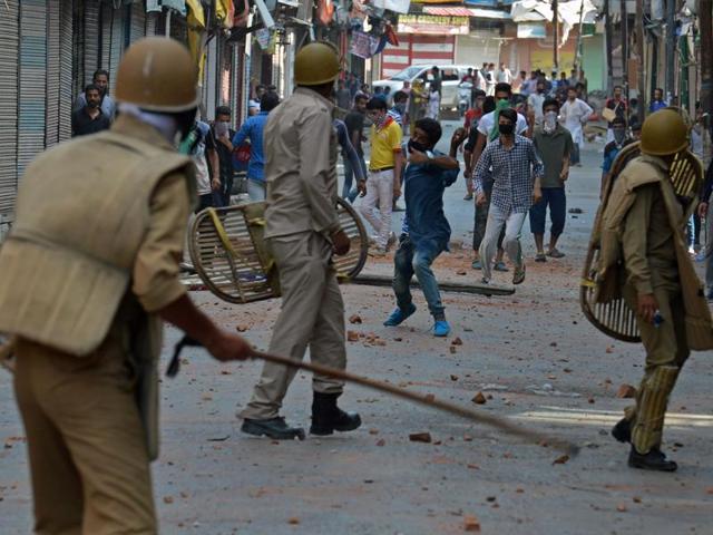 Policemen attempt to dispel Kashmiri protestors in Srinagar in July 2016. Close to 60 people were killed in clashes between security forces and locals in the aftermath of militant Burhan Wani’s death. (AFP Photo) Policemen attempt to dispel Kashmiri protestors in Srinagar in July 2016. Close to 60 people were killed in clashes between security forces and locals in the aftermath of militant Burhan Wani’s death. (AFP Photo)
