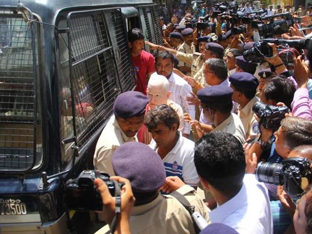 Convicts in Gulberg Society massacre case seen coming out of the police vehicle in Ahmedabad on June 06, 2016.(HT file photo)
