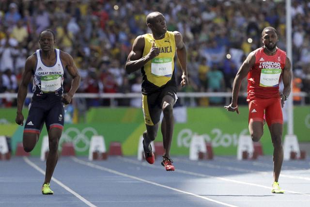 Bolt, centre, Trinidad and Tobago's Richard Thompson, right, and Britain's James Dasaolu compete in a men's 100-metre heat. (AP) Bolt, centre, Trinidad and Tobago's Richard Thompson, right, and Britain's James Dasaolu compete in a men's 100-metre heat. (AP)