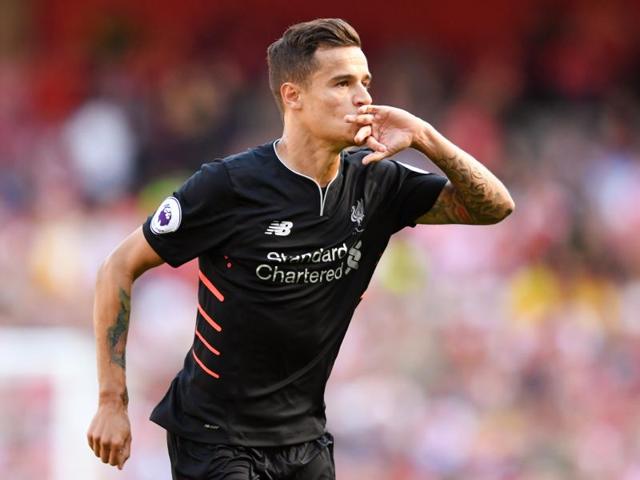 Liverpool's Philippe Coutinho scored a superb freekick to level the scores, before adding a second as the Reds went on to win 4-3 against Arsene Wenger’s men. (REUTERS) Liverpool's Philippe Coutinho scored a superb freekick to level the scores, before adding a second as the Reds went on to win 4-3 against Arsene Wenger’s men. (REUTERS)