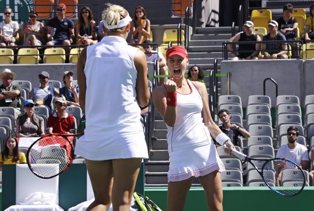 Russia's Ekaterina Makarova, right, pumps her fist after winning a point with partner Elena Vesnina against Switzerland during their women's doubles gold medal match. (AP) Russia's Ekaterina Makarova, right, pumps her fist after winning a point with partner Elena Vesnina against Switzerland during their women's doubles gold medal match. (AP)