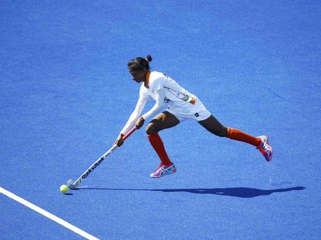Nikki Pradhan charges forward with the ball against Argentina. (REUTERS) 