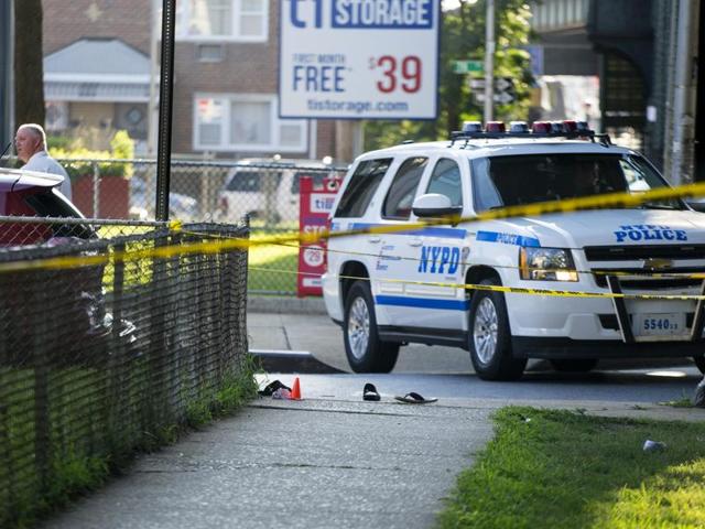 Sandals lay on a street corner at the crime scene not far from the Al-Furqan Jame Masjid Mosque in the Ozone Park neighbourhood of Queens, New York, where the leader of a New York City mosque was fatally shot.(AP) Sandals lay on a street corner at the crime scene not far from the Al-Furqan Jame Masjid Mosque in the Ozone Park neighbourhood of Queens, New York, where the leader of a New York City mosque was fatally shot.(AP)
