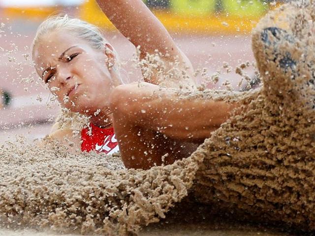 Darya Klishina of Russia competes in the women's long jump qualifying round during the 15th IAAF World Championships at the National Stadium in Beijing, China, August 27, 2015.(REUTERS)