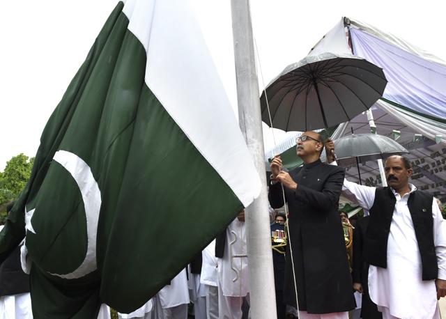 Abdul Basit hoits Pakistan’s flag during the Independence Day celebrations in Delhi. (Arvind Yadav/HT Photo) Abdul Basit hoits Pakistan’s flag during the Independence Day celebrations in Delhi. (Arvind Yadav/HT Photo)