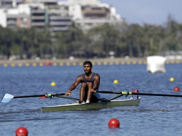 Dattu Baban Bhokanal, of India, competes in the men's rowing single sculls final D. Bhokanal won the final, finishing 13th overall, having been out of medal contention already. (AP) 