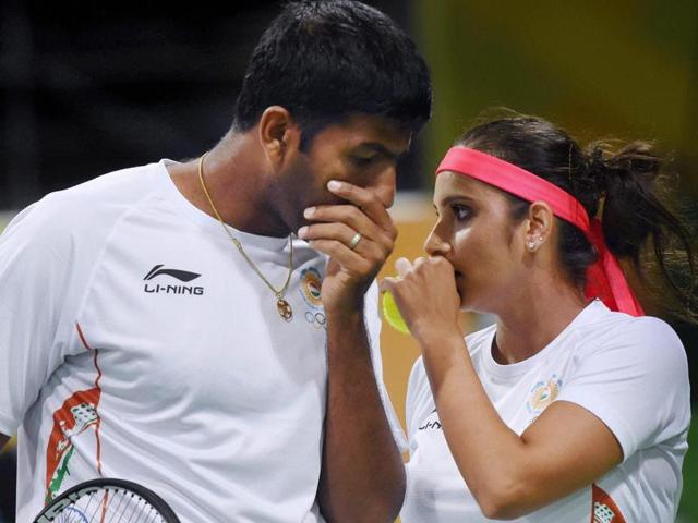 Sania Mirza And Rohan Bopanna play their mixed doubles semifinal match. (PTI Photo) Sania Mirza And Rohan Bopanna play their mixed doubles semifinal match. (PTI Photo)