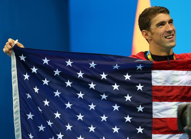 Michael Phelps of the USA celebrates his team's gold. (REUTERS) Michael Phelps of the USA celebrates his team's gold. (REUTERS)