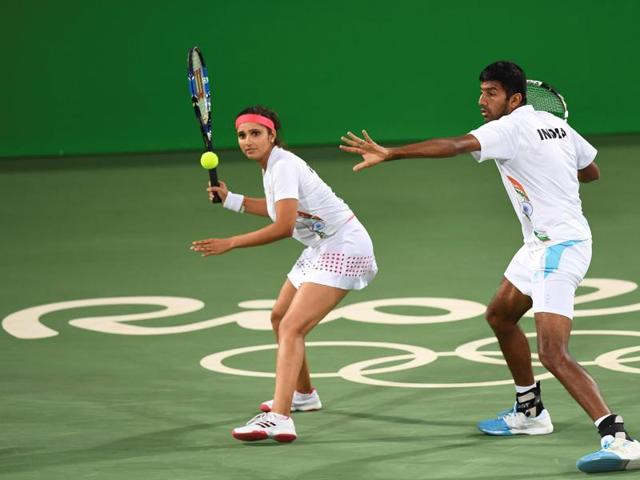 India's Sania Mirza (L) and Rohan Bopanna lost to Venus Williams and Rajeev Ram of the United States 6-2, 2-6, 10-3 in the semifinals of the mixed doubles at the Rio Olympics on Saturday, August 13. Mirza and Bopanna will contest the bronze medal match against Lucie Hradecka and Radek Stepanek of the Czech Republic on Sunday. (AFP) 